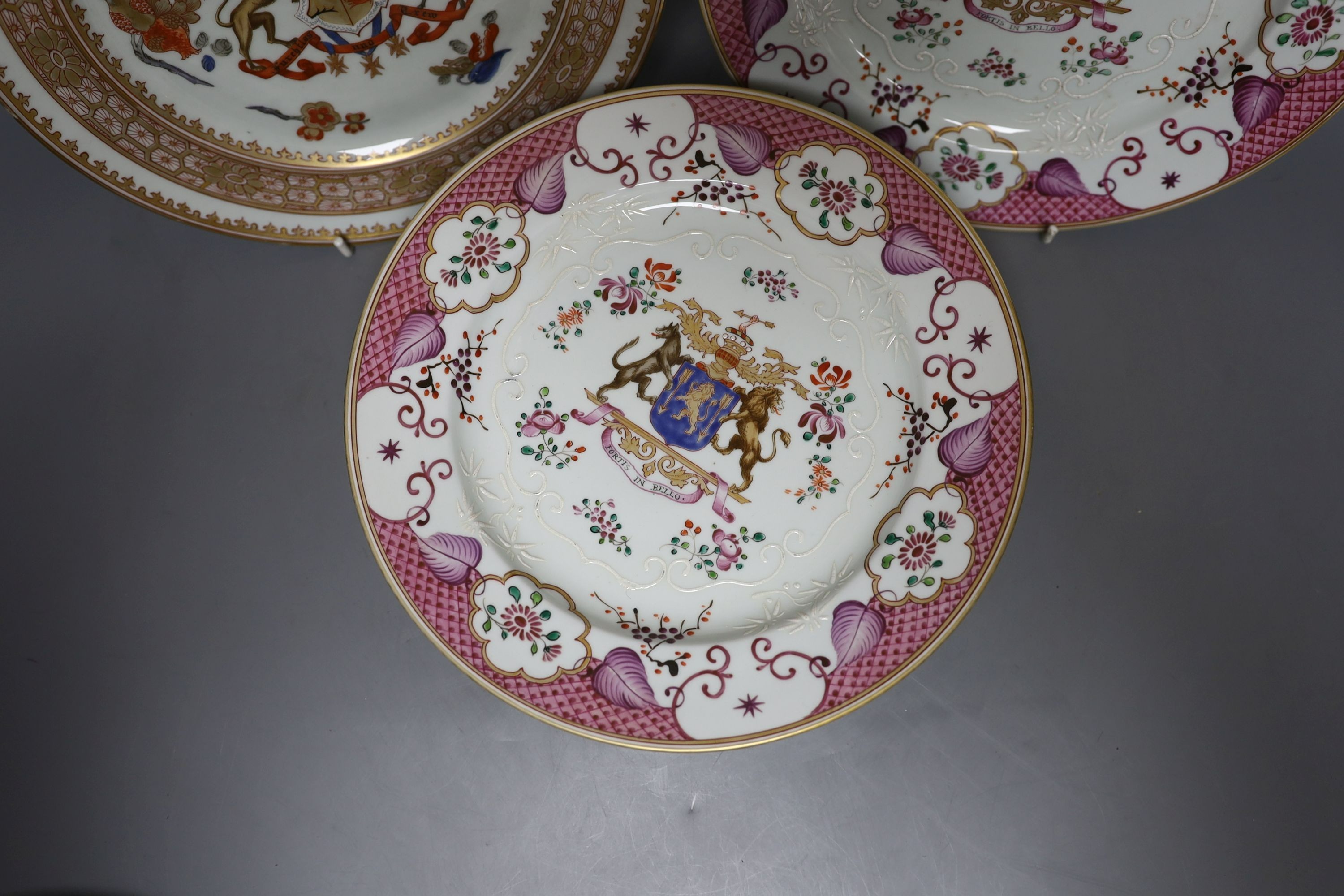 A collection of seven Chinese export armorial porcelain plates by Samson of Paris